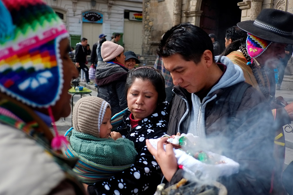 A family carries figurines of the Christ Child outside St. Francis Church during celebrations for the feast of the Epiphany, Jan. 6, 2019, in La Paz, Bolivia. (CNS/Reuters/David Mercado) A family carries figurines of the Christ Child outside St. Francis Church during celebrations for the feast of the Epiphany, Jan. 6, 2019, in La Paz, Bolivia. (CNS/Reuters/David Mercado)